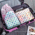 Travel fold non woven drawstring storage bag